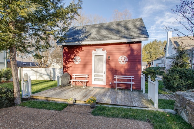 rear view of property with a deck