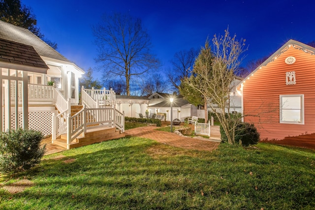 view of yard featuring a deck