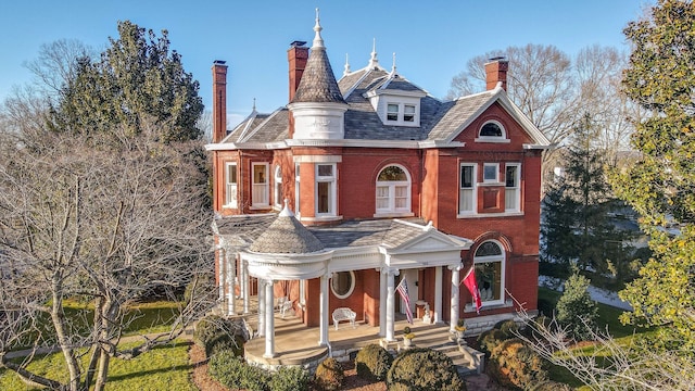 victorian home featuring a porch