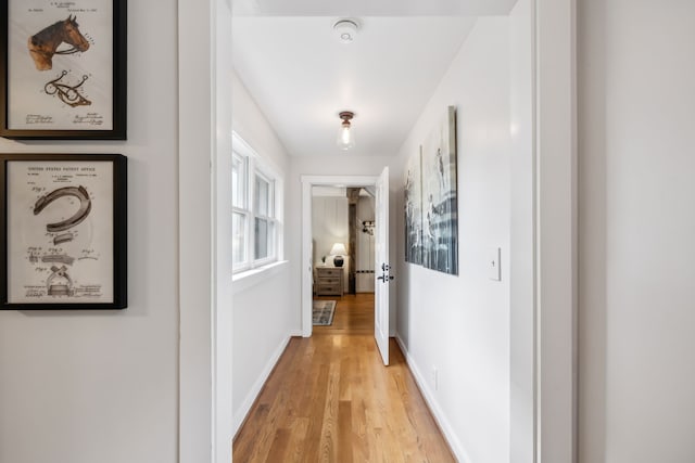 corridor featuring light wood-type flooring