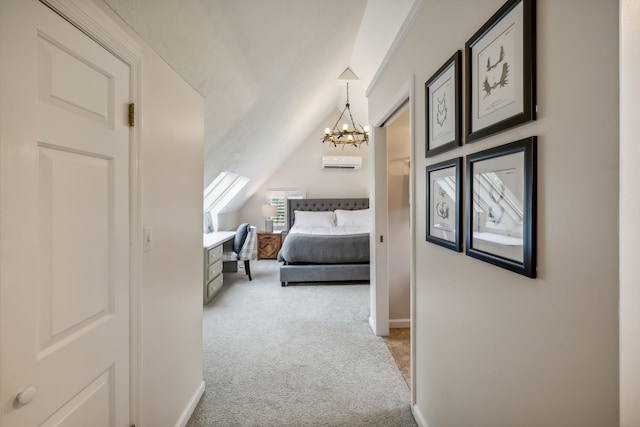 bedroom featuring carpet floors, lofted ceiling, and a notable chandelier