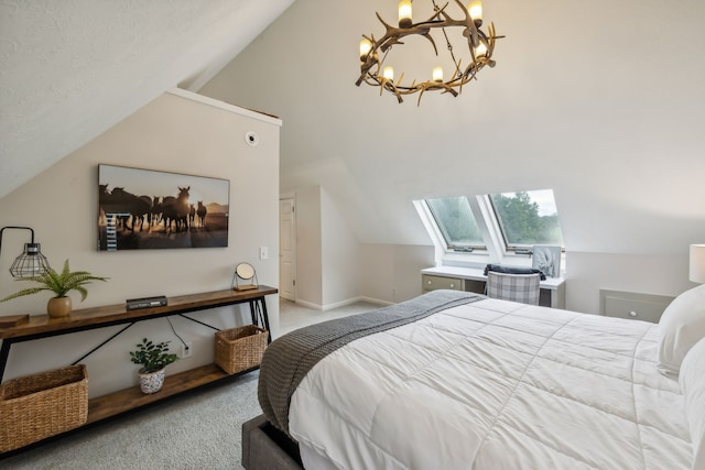 carpeted bedroom with vaulted ceiling with skylight and a notable chandelier