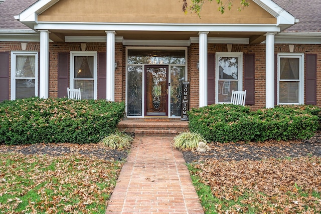 doorway to property with covered porch