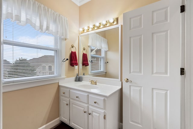 bathroom featuring vanity and crown molding