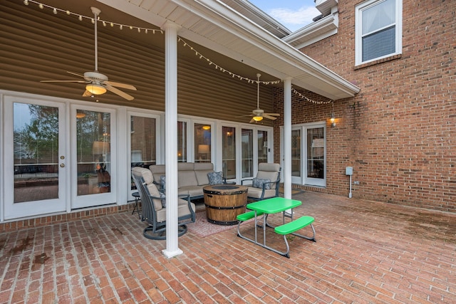 view of patio featuring french doors and ceiling fan