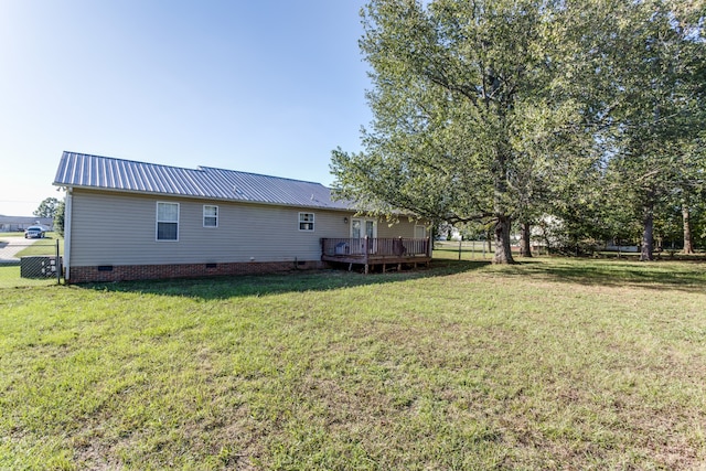 view of yard featuring a wooden deck