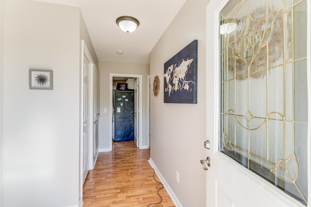 corridor featuring light wood-type flooring