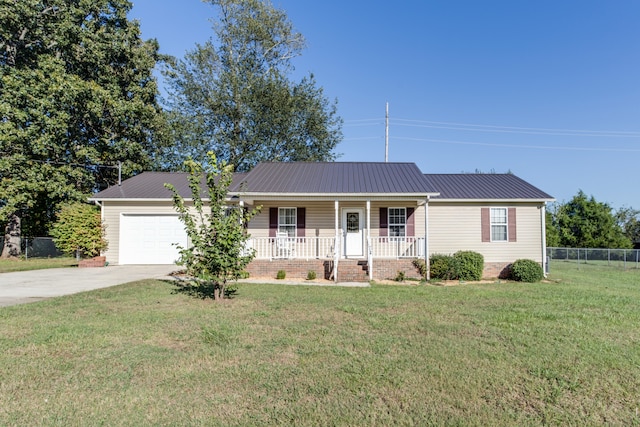 single story home with a garage, a front yard, and covered porch