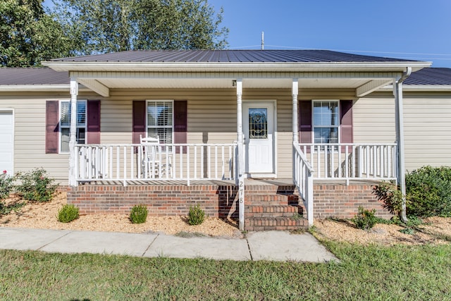 view of front facade featuring covered porch