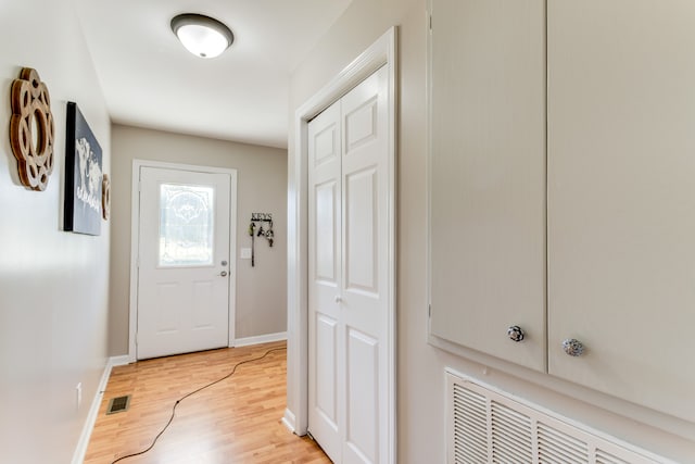 doorway featuring light wood-type flooring