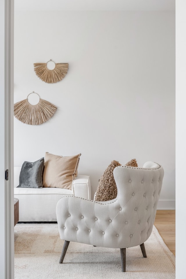 sitting room featuring light hardwood / wood-style flooring