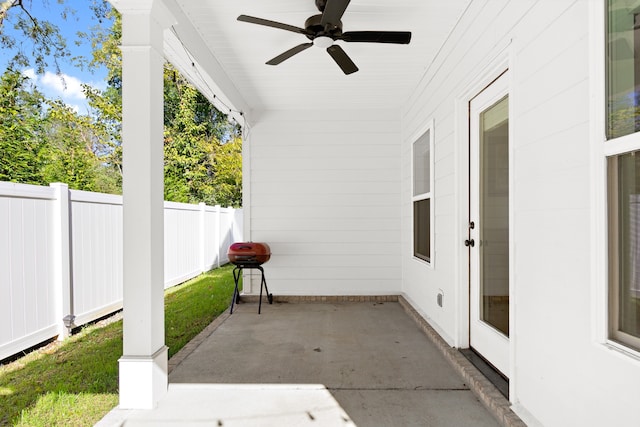 view of patio featuring ceiling fan