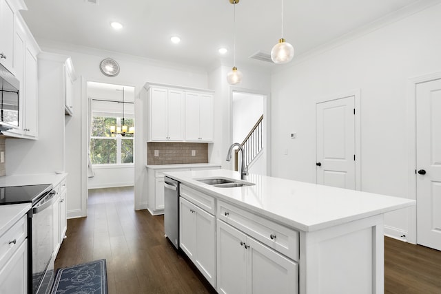 kitchen featuring a kitchen island with sink, sink, stainless steel appliances, dark hardwood / wood-style floors, and white cabinets