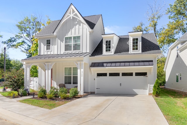 modern farmhouse style home featuring a garage