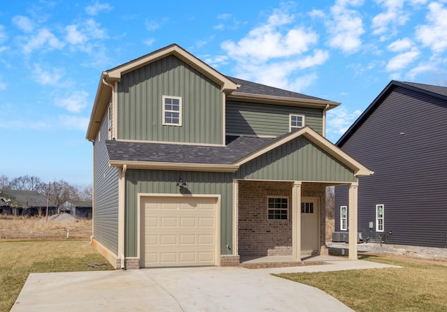 view of front facade featuring driveway, roof with shingles, an attached garage, brick siding, and board and batten siding