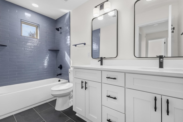 full bathroom with tile patterned flooring, tub / shower combination, toilet, double vanity, and a sink