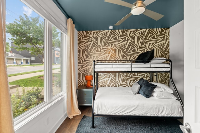 bedroom featuring hardwood / wood-style flooring and ceiling fan