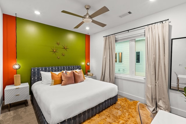 carpeted bedroom with ceiling fan