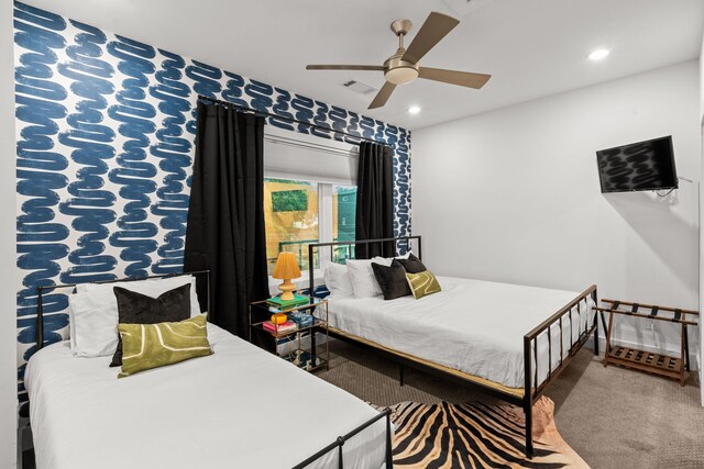 bedroom featuring ceiling fan and carpet flooring