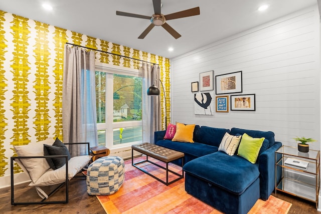 living room with ceiling fan, hardwood / wood-style flooring, and plenty of natural light