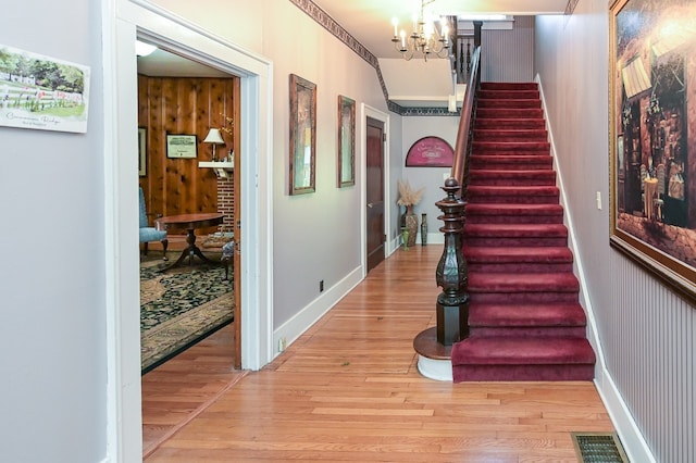 interior space with hardwood / wood-style floors and a chandelier