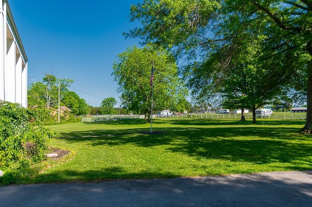 surrounding community featuring a lawn