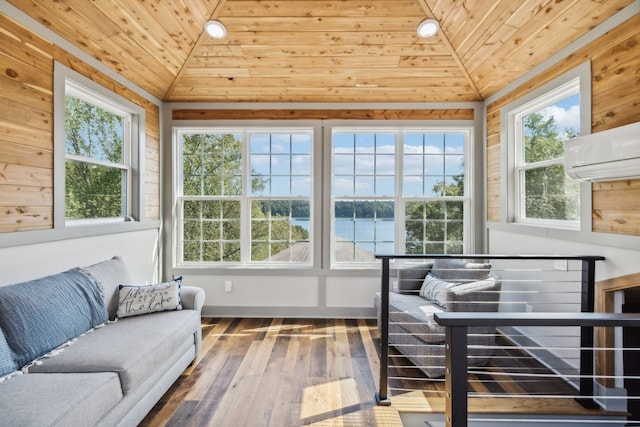 sunroom / solarium featuring a water view, a wall unit AC, vaulted ceiling, and wood ceiling