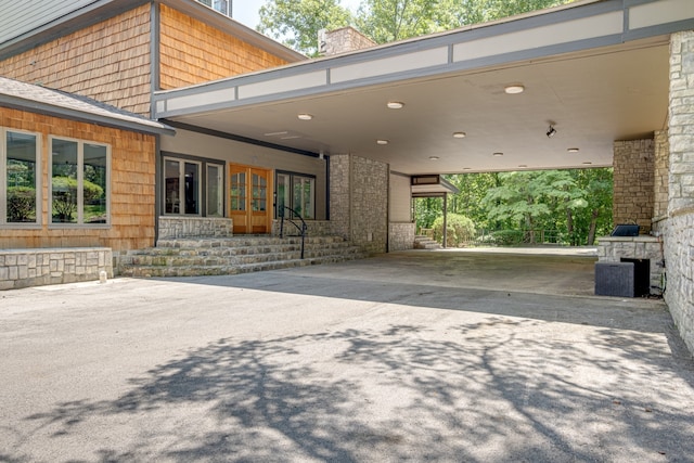 exterior space with a carport