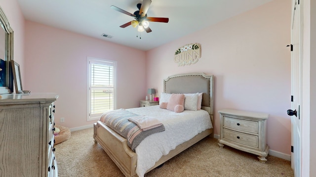 bedroom with light colored carpet and ceiling fan