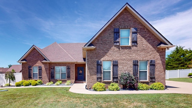 view of front facade with a front yard