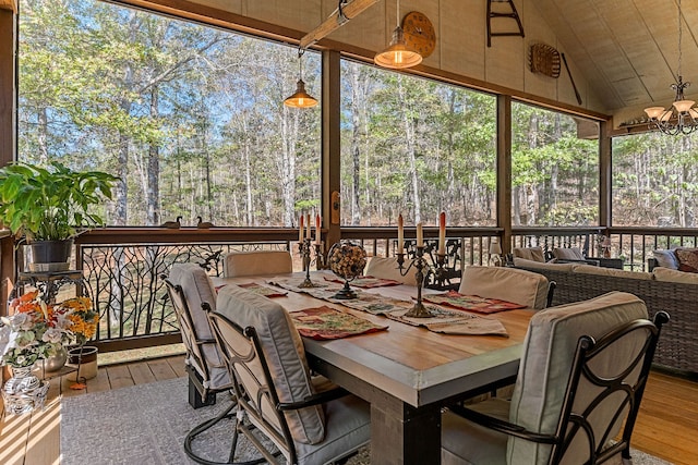 sunroom with vaulted ceiling