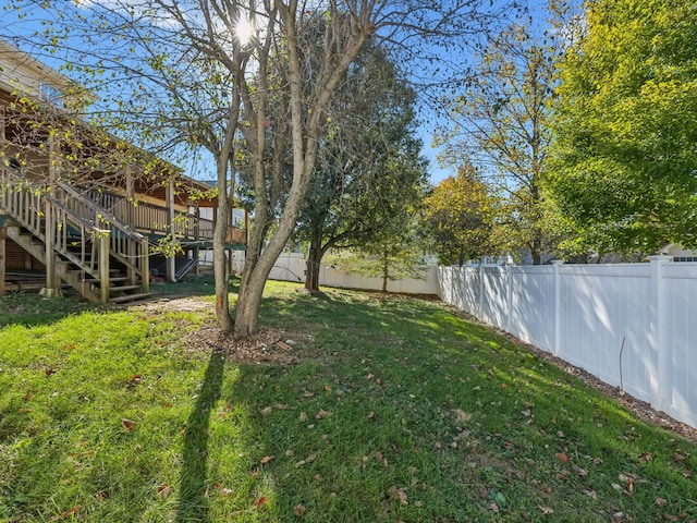 view of yard with a deck