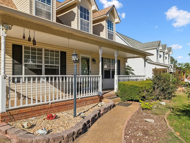 view of front of property featuring covered porch