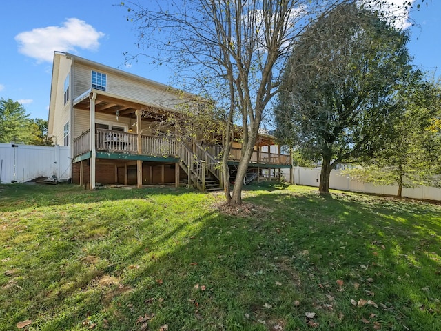 view of yard with a wooden deck