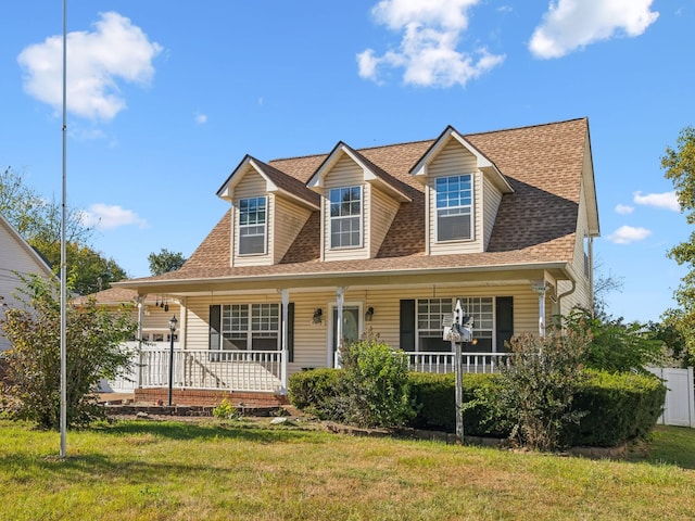 view of front of home featuring a porch and a front lawn