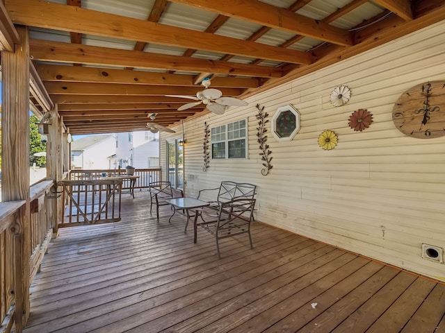 wooden deck with ceiling fan