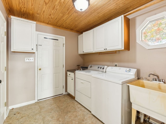 clothes washing area featuring sink, independent washer and dryer, wooden ceiling, and cabinets