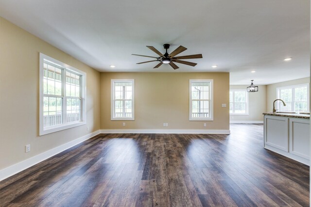 10890 Minor Hill Hwy, Goodspring, TN 38460 - unfurnished living room featuring dark wood-style floors, a sink, baseboards, recessed lighting, and a chandelier