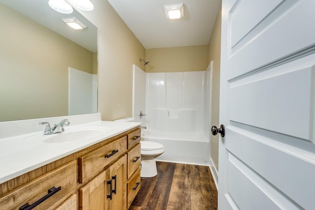 10890 Minor Hill Hwy, Goodspring, TN 38460 - bathroom with toilet, vanity, wood finished floors, and washtub / shower combination