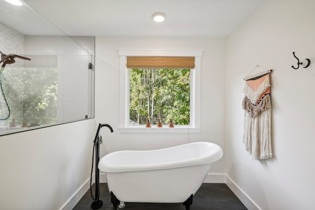 bathroom with shower with separate bathtub