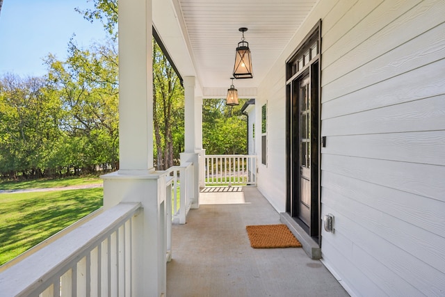 view of patio featuring a porch