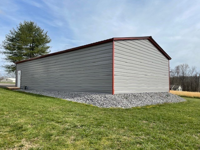 garage with a lawn