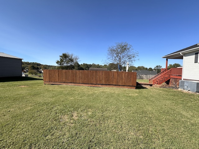 view of yard featuring central AC