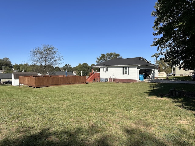 view of yard featuring central AC