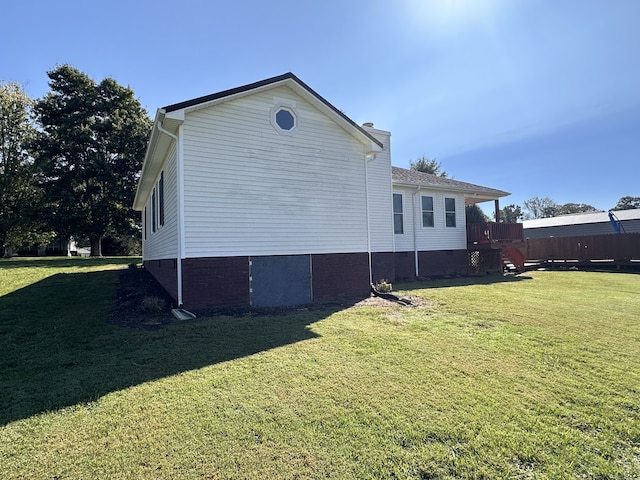 view of home's exterior featuring a lawn