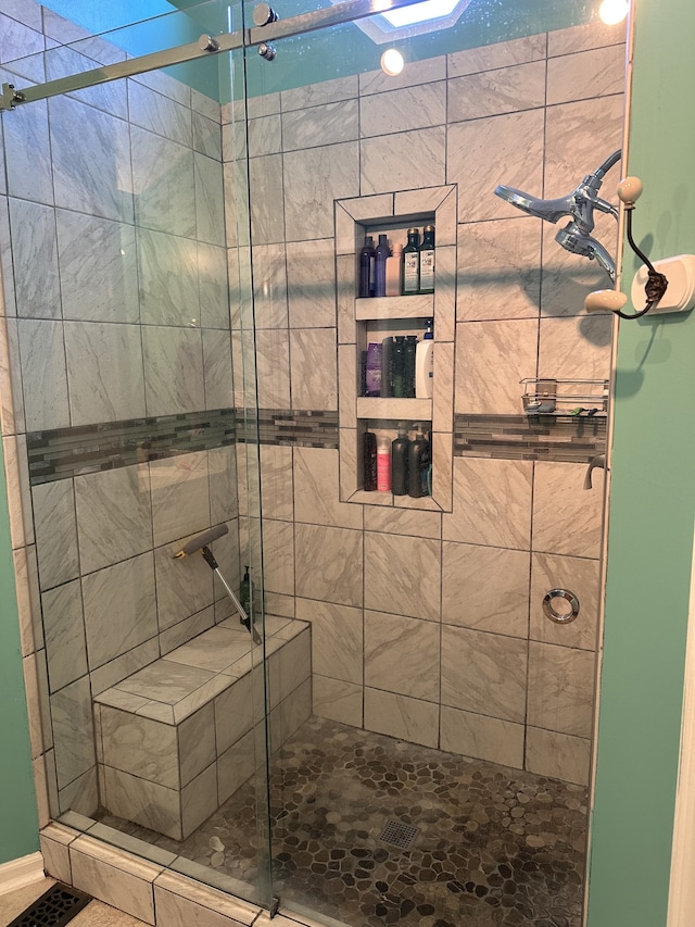 bathroom featuring walk in shower