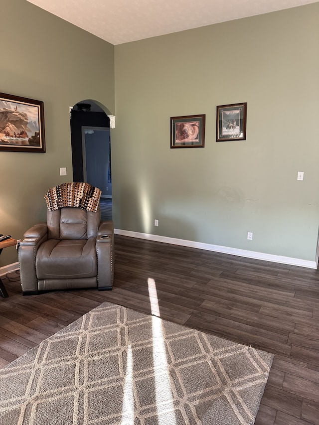 living room with dark wood-type flooring