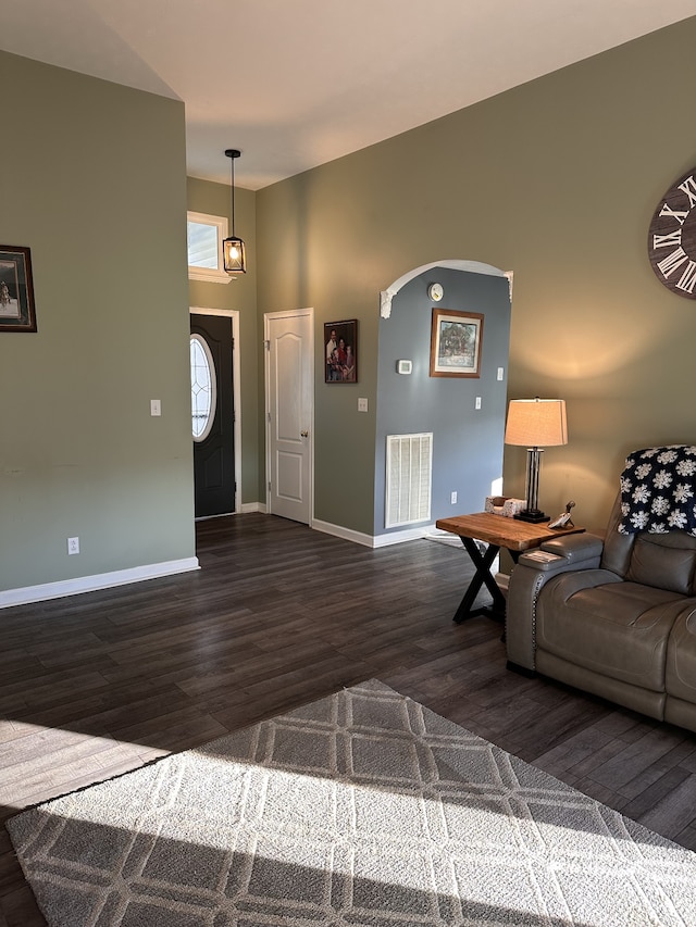 living room featuring dark hardwood / wood-style flooring