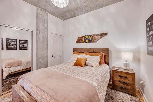 bedroom featuring wood-type flooring