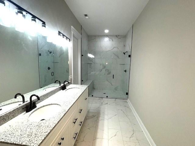 bathroom with vanity and an enclosed shower